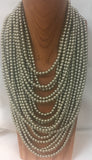 MULTI STRAND LAYERED PEARL NECKLACE
